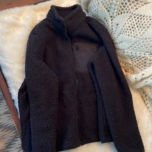Black Tommy Hilfiger, size large,zip up Sherpa womens jacket.